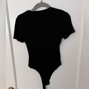 Naked wardrobe black short sleeve bodysuit